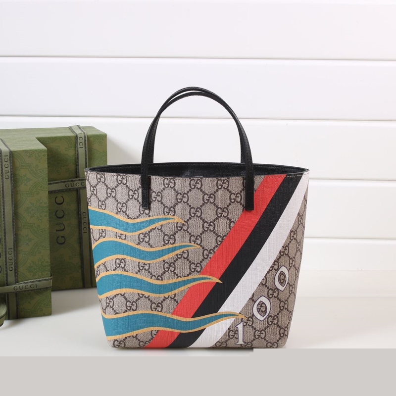 G*u*i shopping bags
